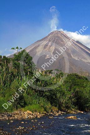 Arenal Volcano and fresh water stream near La Fortuna, San Carlos, Costa Rica.