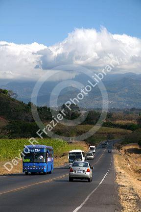 Traffic along the Pan American Highway CR1 just west of San Jose, Costa Rica.