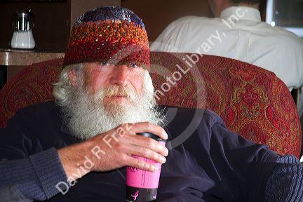 Elderly man in a coffee shop in Boise, Idaho, USA. MR