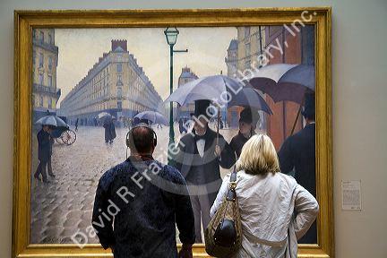 Paris Street; Rainy Day painting by Gustave Caillebotte displayed at the Art Institute of Chicago, Illinois, USA.