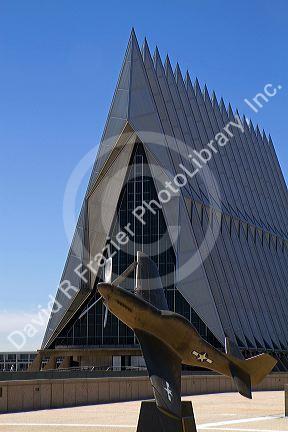 Bronze sculpure of vintage WW11 aircraft in front of the Cadet Chapel at the Air Force Academy in Colorado Springs, Colorado, USA.