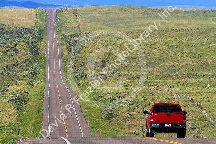 Truck traveling on U.S. Route 40 in western Colorado, USA.