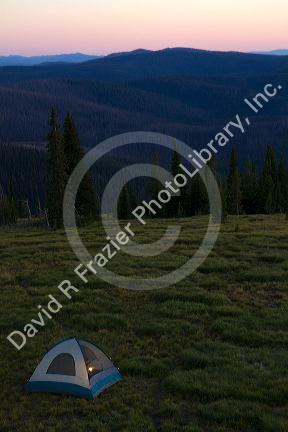 Tent camping at the summit of Green Mountain along the historic Magruder Corridor road that devides the Frannk Church-River of No Return Wilderness Area and the Selway-Bitterwoot Wilderness in Idaho, USA.