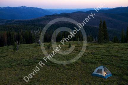 Tent camping at the summit of Green Mountain along the historic Magruder Corridor road that devides the Frannk Church-River of No Return Wilderness Area and the Selway-Bitterwoot Wilderness in Idaho, USA.