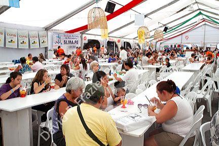 People dine on seafood and paella at a Fisherman Festival in Mar del Plata, Argentina.