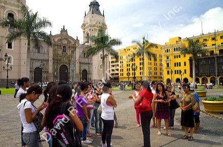 Basilica Cathedral and the Municipal Palace at the Plaza Mayor or Plaza de Armas of Lima, Peru.