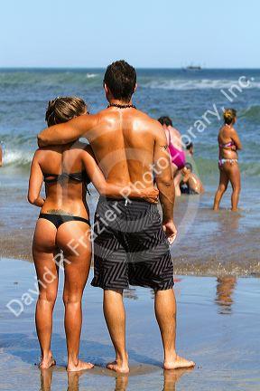 Couple on the beach at Miramar, Argentina.