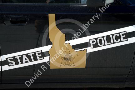 Idaho State Police shield on the door of a patrol car in Boise, Idaho, USA.