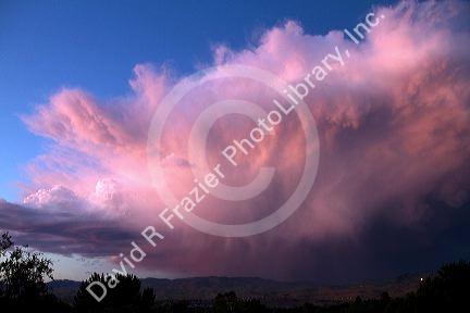 Summer storm cloud at sunset over the foothills near Boise, Idaho, USA.