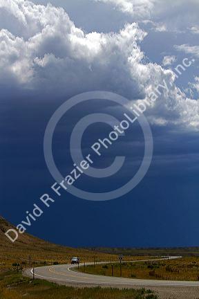 Storm clouds and highway near Green River, Wyoming, USA.