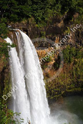 Wailua Falls located on the Wailua River in Wailua River State Park on the eastern side of the island of Kauai, Hawaii, USA.