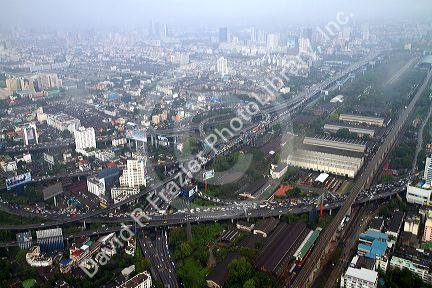 View of the Bangkok cityscape taken from the Baiyoke Tower II showing air pollution and smog, Thailand.