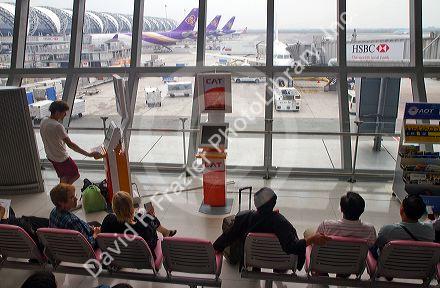 Departure gate and waiting area in the terminal at the Suvarnabhumi Airport also known as the New Bangkok International Airport in Bangkok, Thailand.