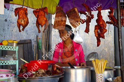 Street food vendor selling various meats in (Rangoon) Yangon, (Burma) Myanmar.
