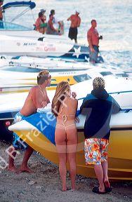 Thong bikini and boaters at Lake Havasu, Arizona.