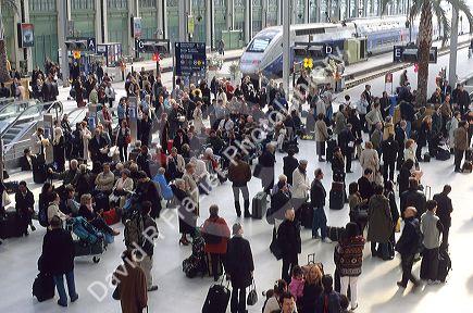 People traveling at Gare de Lyon train station in Paris, France.