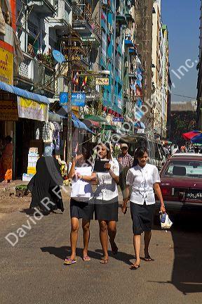 Street scene and pedestrians in central (Rangoon) Yangon, (Burma) Myanmar.