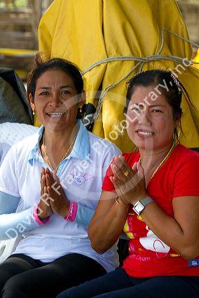 Thai women give traditional greeting at Chaweng beach on the island of Ko Samui, Thailand.