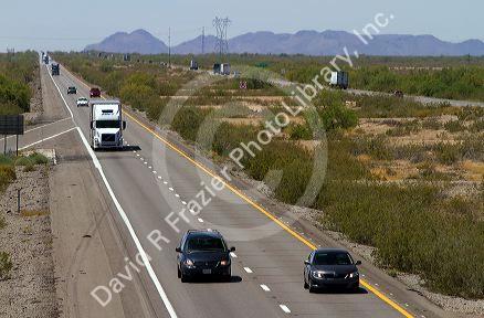 Vehicles travel on Interstate 10 west of Phoenix, Arizona, USA.