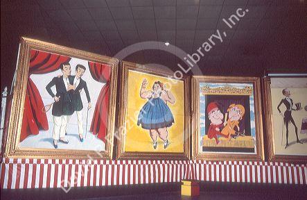 Framed paintings of circus posters displayed at the Ringling Circus Museum in Sarasota, Florida.