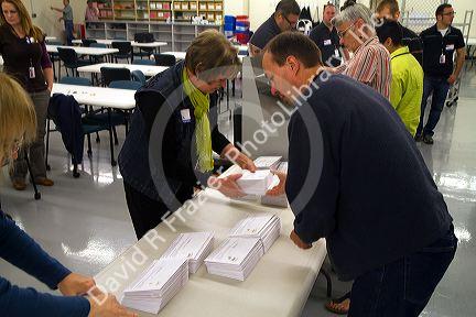 Election workers receiving absentee voter ballots in envelopes at the Ada County Elections building in Boise, Idaho, USA.