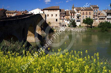 Six-arched Roman bridge spanning the Arga River on the Way of St. James pilgrimage route in Puente La Reina, Navarra, Spain.