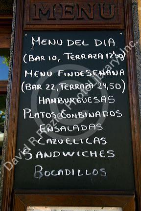 Menu board for a restaurant at Puente La Reina a Basque town along the Way of St. James pilgrimage route, Navarra, Spain.