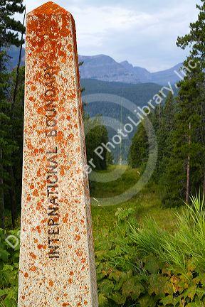 International border marker at Waterton-Glacier International Peace Park at Montana, USA and Alberta, Canada.
