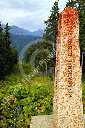 International border marker at Waterton-Glacier International Peace Park at Montana, USA and Alberta, Canada.