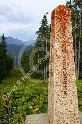 International border marker at Waterton-Glacier International Peace Park at Montana, USA and Alberta, Canada.