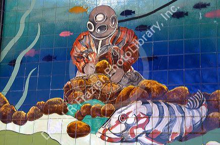 Mosaic tile public art depicting a sponge diver at Tarpon Springs, Florida, USA.