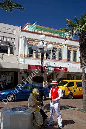 A couple dressed in period clothing during the Tremains Art Deco Weekend at Napier in the Hawke's Bay Region, North Island, New Zealand.