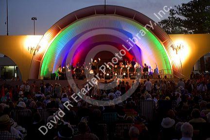 People attend a concert in a shell theater during the Tremains Art Deco Weekend  at Napier in the Hawke's Bay Region, North Island, New Zealand.