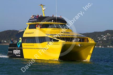 A dolphin viewing tour boat in the Bay of Islands, North Island, New Zealand.