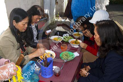 Teachers from the Pedagogical College of Da Lat eating breakfast, Vietnam.