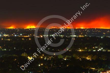 Night view of the Soda Fire in Owyhee County with Boise city in the foreground, Idaho, USA.