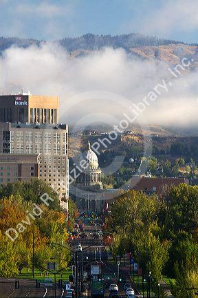 View of capital boulevard and the Idaho state capitol building on a misty morning in downtown Boise, Idaho, USA.
