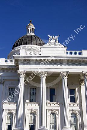 The dome and sculpture on top of the California state capitol building in Sacramento.