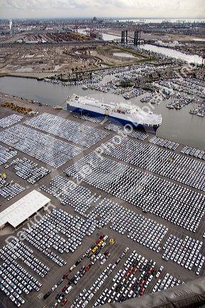 Automobiles being unloaded from a ship at the Port of Long Beach in Los Angeles, California.
