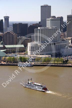 Creole Queen riverboat passing the city of the New Orleans along the Mississippi River, Louisisana.