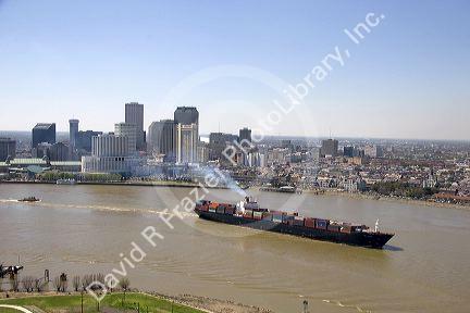 Container ship on the Mississippi River departing New Orleans, Louisiana.
