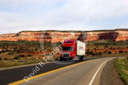 Semi truck traveling on US highway 191 south of Moab, Utah.