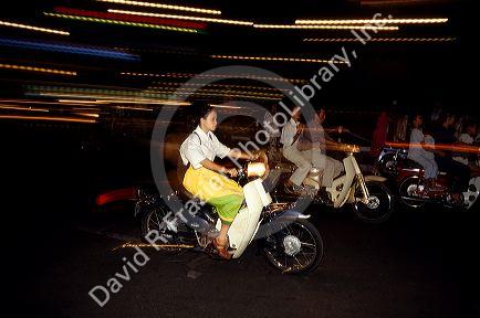 Nightime motorcyclist's in Saigon, Vietnam.