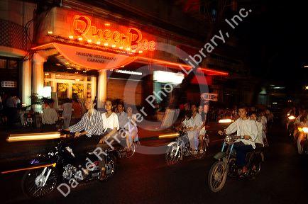 Motorcyclist's at night in Saigon, Vietnam.