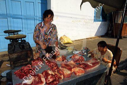 An open air butcher shop in Saigon, Vietnam.