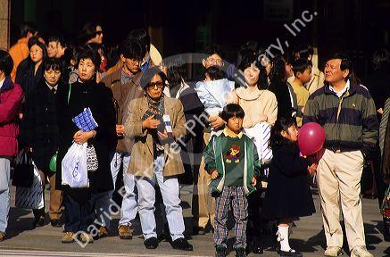 Sunday shoppers on Ginza street in Tokyo, Japan.