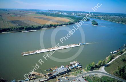 Tugboat pushing barges down the Mississippi River north of St. Louis, Missouri.