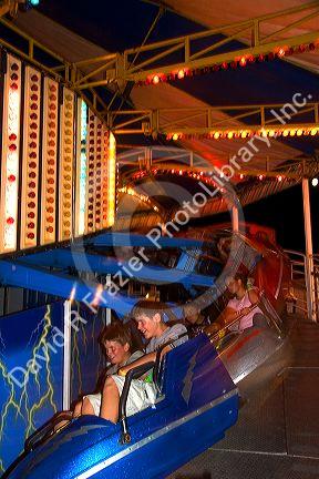 Kids on a ride at the Iowa state fair in Des Moines.