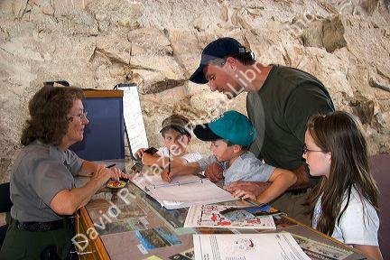 Father and children with Park Ranger at Dinosaur National Monument near Vernal, Utah.  (Model released)