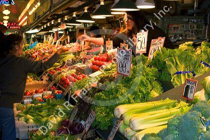 Fruit and vegetable stand at the Pike Place Market in Seattle, Washington.